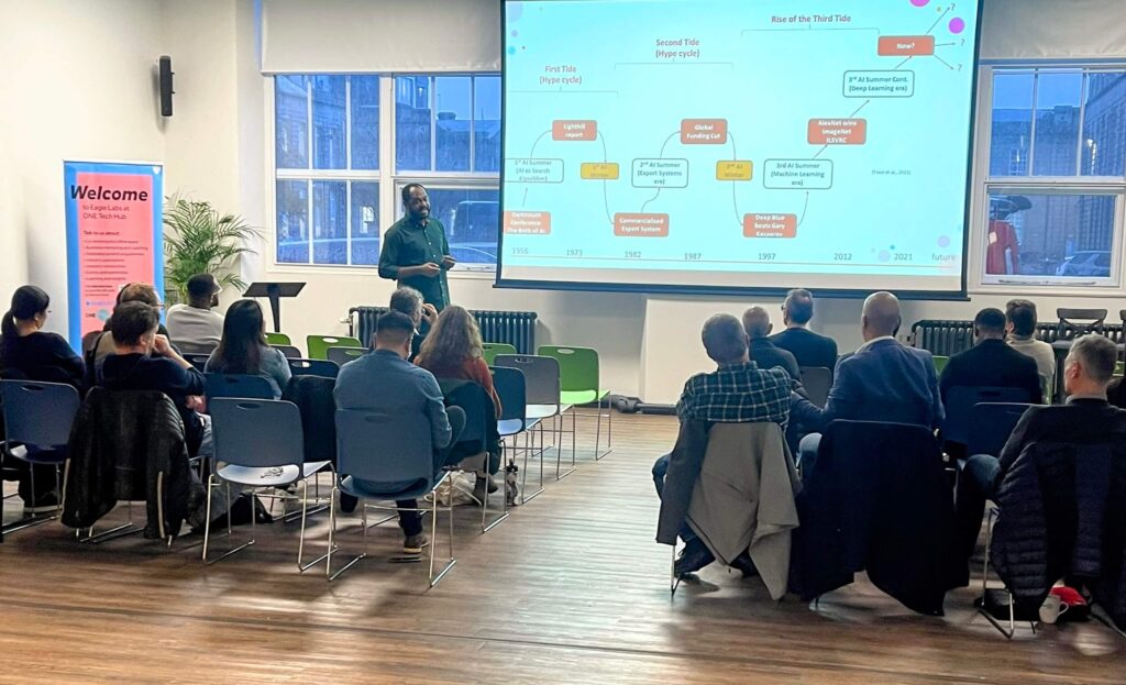 AI and You How AI is shaping your Experience event in aberdeen, with people watching a talk