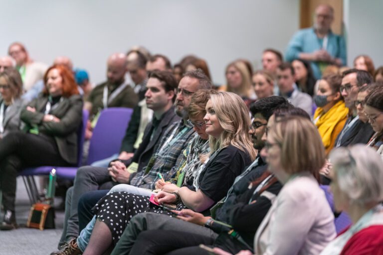 Photo of a seated audience at Data Summit 2023 Tech Stage