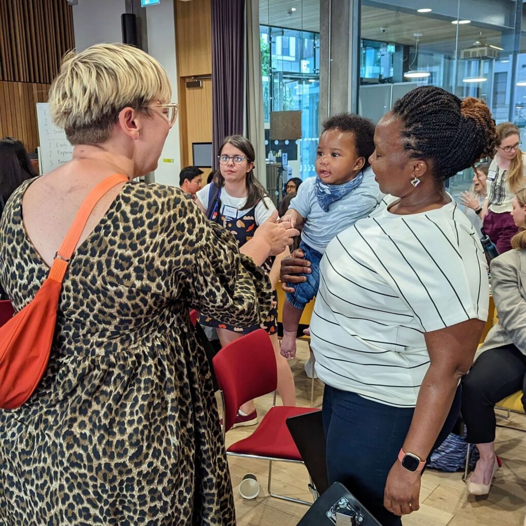 Guests networking at women in data and ai event