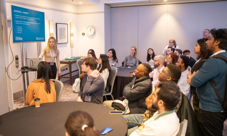 group of international students programme listening to a lecturer