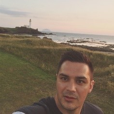 Graham McGowan on a hill with a view