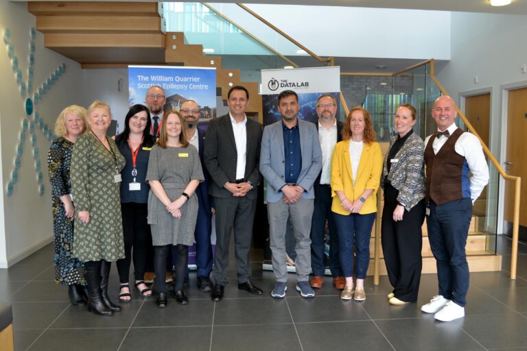 Group photo. Pictured are, left to right: Lorraine Jackson, Hospital Manager; Joanne Hill, Clinical Nurse Specialist; Joan Kane, Clinical Physiologist; Alistair Dixon, Director of People and Technology; Elaine McAllister, Senior Clinical Administrator – all from Quarriers. Professor Hadi Larijani, Glasgow Caledonian University, Anas Sarwar, Scottish Labour Leader; Syed Yaseen Shah, PHD student Glasgow Caledonian University. Brian Hills, Chief Executive The Data Lab; Alison Orr, The Data Lab Director of Marketing and Communications. Katy Martin, Head of Development and External Relations, and John McMaster, IT Infrastructure Manager, both Quarriers.