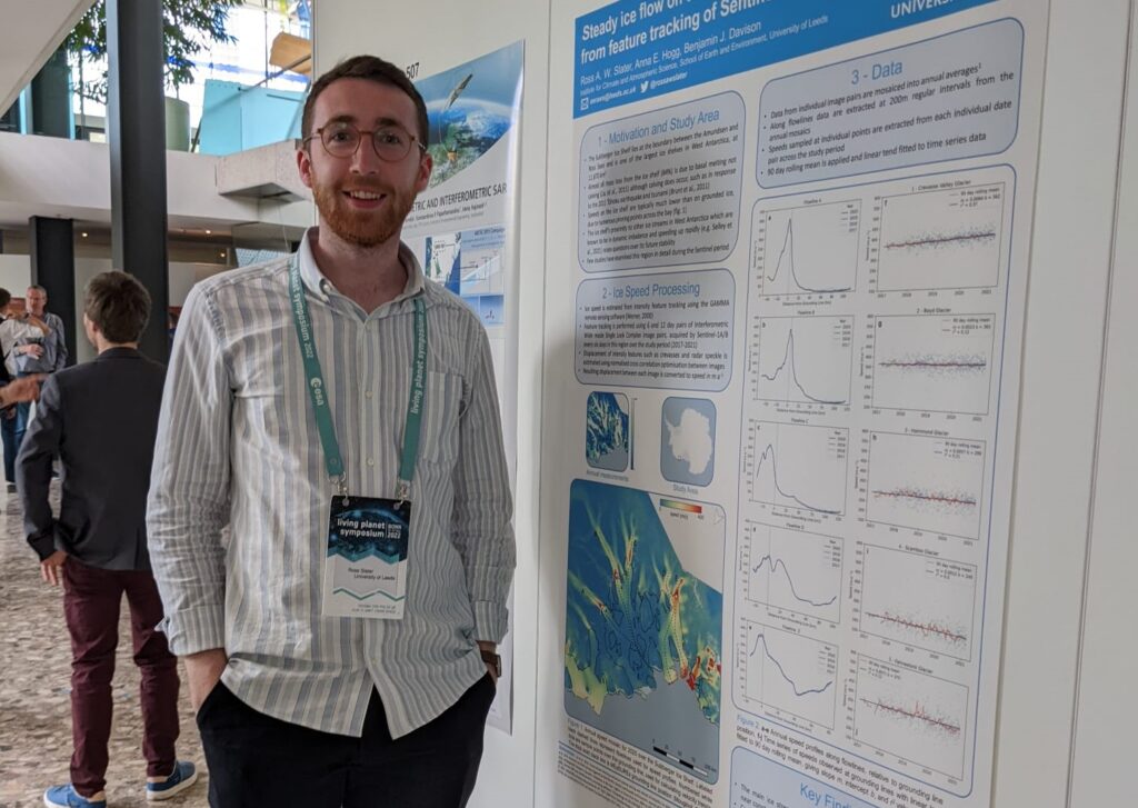 Ross Slater next to a study chart about ice flow