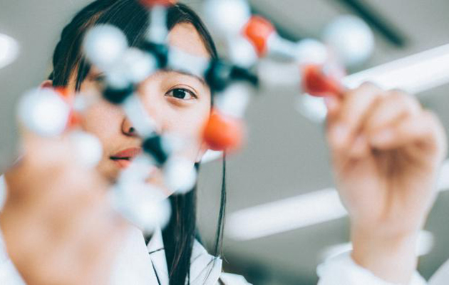 School child doing STEM activity
