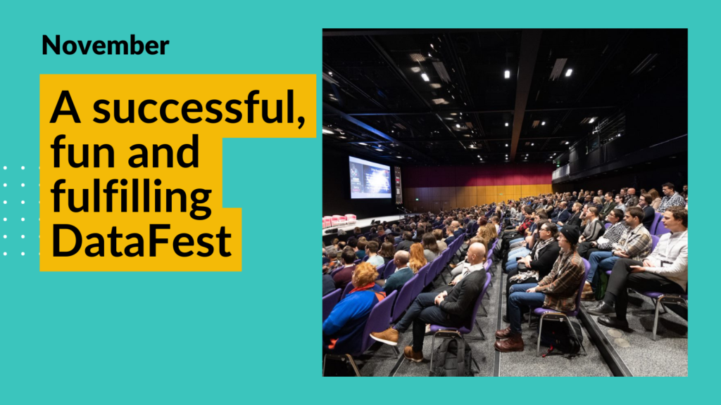 Crowd shot at Data Fest - hundreds of people sitting in a conference room facing the stage. Overlay text reads "A successful, fun and fulfilling DataFest"